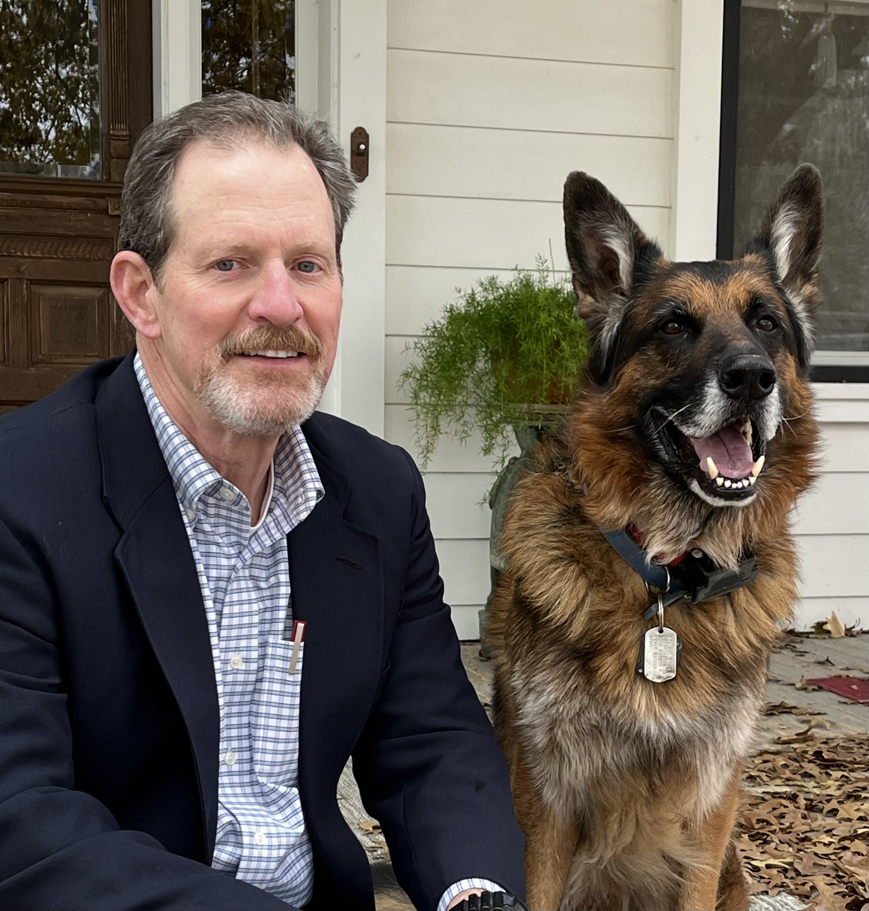 Home Instead Owner David Stuart and his dog Aldo