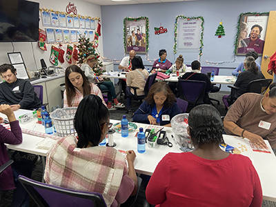 The Home Instead Team Wrapping BASTAS Gifts
