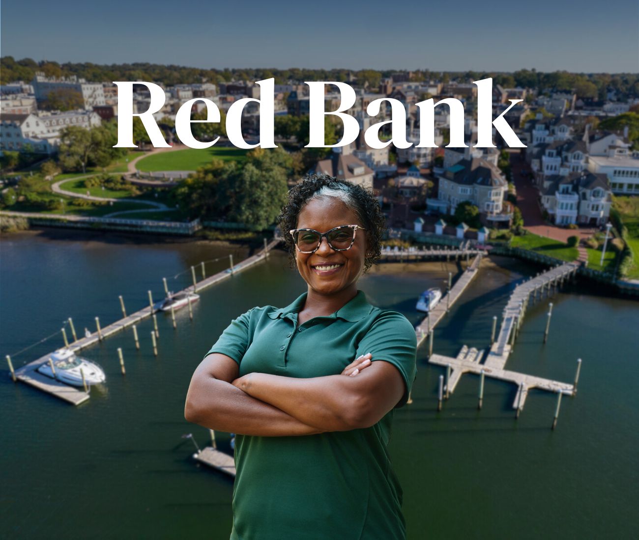 Home Instead caregiver with Red Bank, New Jersey in the background