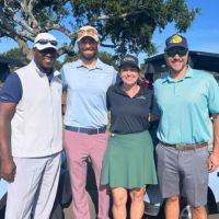 home instead team members at golf tournament