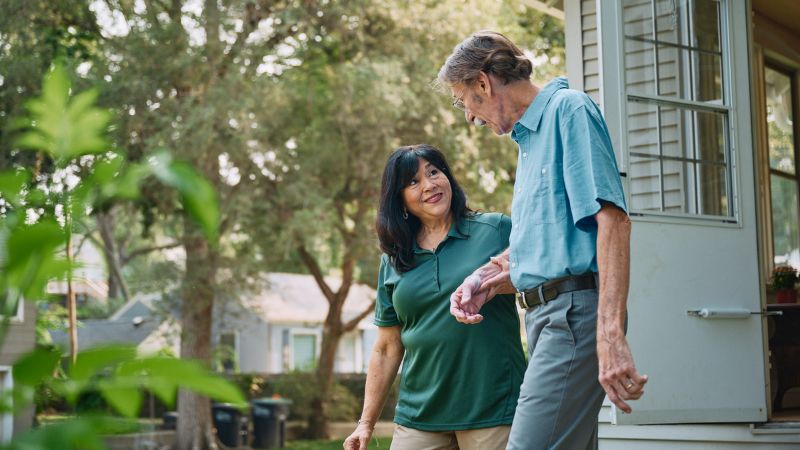 Home Instead caregiver with senior client in Lido Key, FL