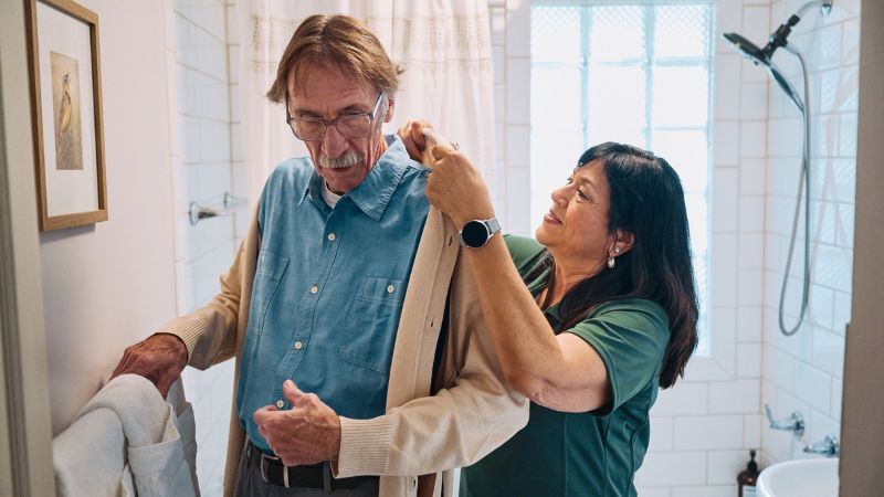 Home Instead caregiver with senior client