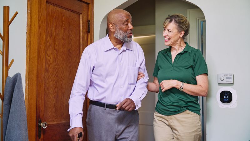 Home Instead caregiver and senior client