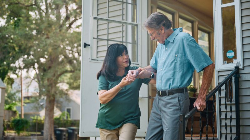 Home Instead caregiver with senior client