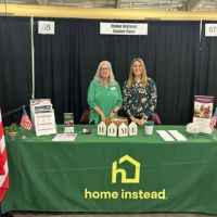 home instead booth at wellness expo
