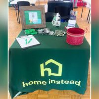 Home Instead booth at employer engagement fair