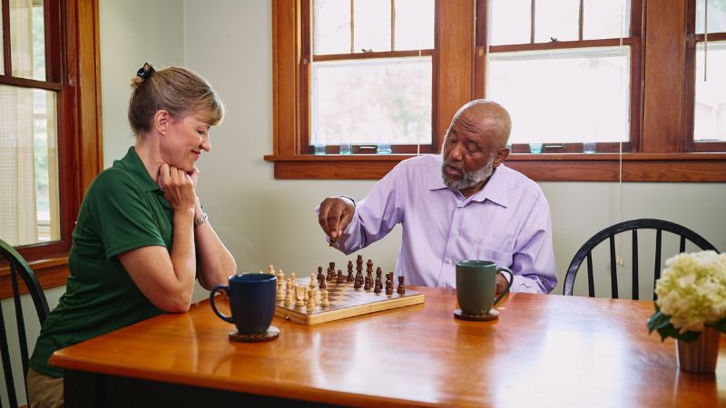 Home Instead caregiver and senior client