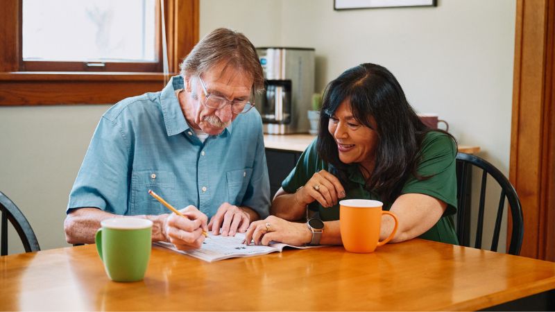 Home Instead caregiver with senior client