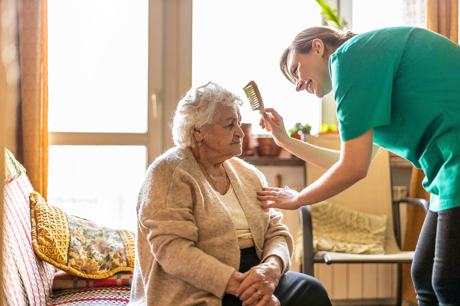 bigstock Female nurse taking care of a 412940275