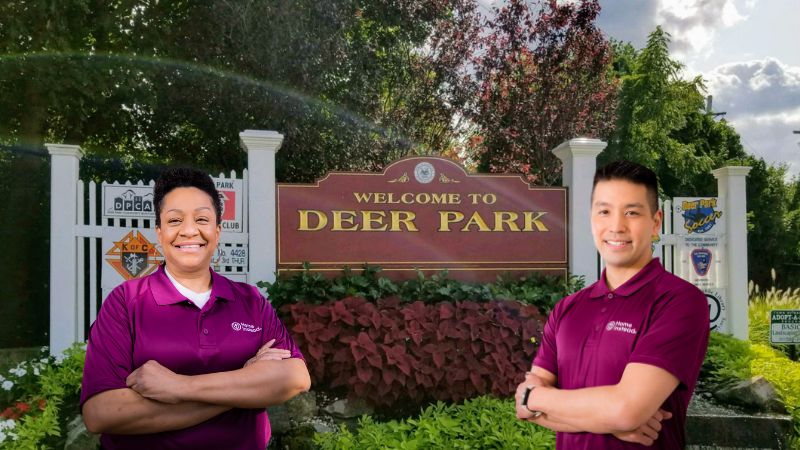 Home Instead caregiver with Deer Park New York in the background