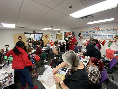 The Home Instead Team Wrapping BASTAS Gifts 3 