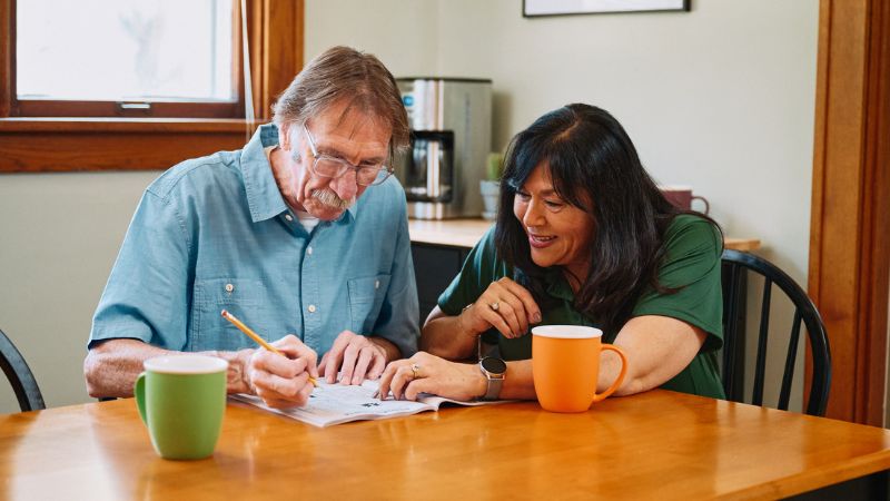 Home Instead caregiver with a senior client