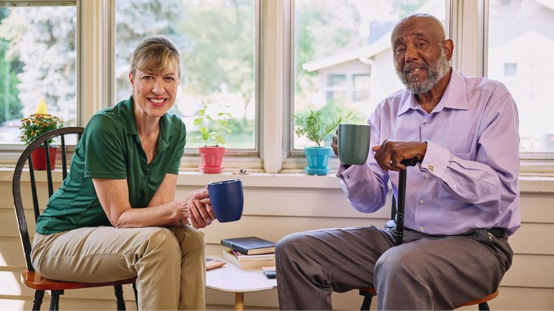 Home Instead caregiver with senior client