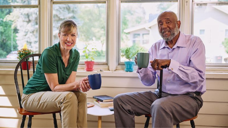 Home Instead caregiver with senior client