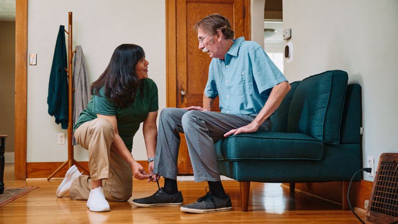 Home Instead caregiver and senior client