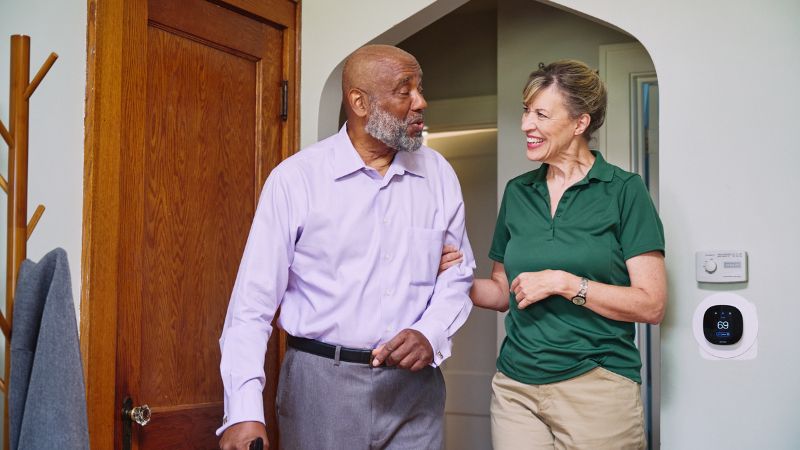 Home Instead caregiver with senior client in Kensington Park, FL