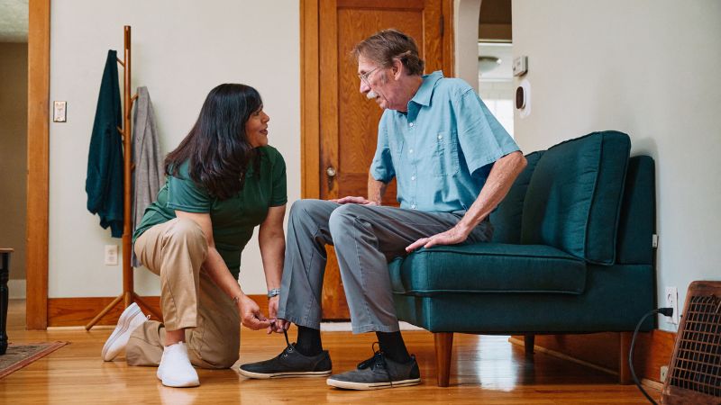 Home Instead caregiver and senior client