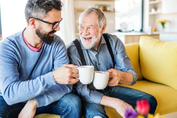 bigstock An Adult Son And Senior Father 303286090